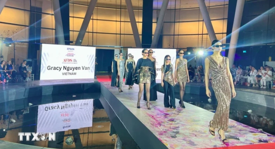 Vietnamese designers, models attend ASEAN International Fashion Week